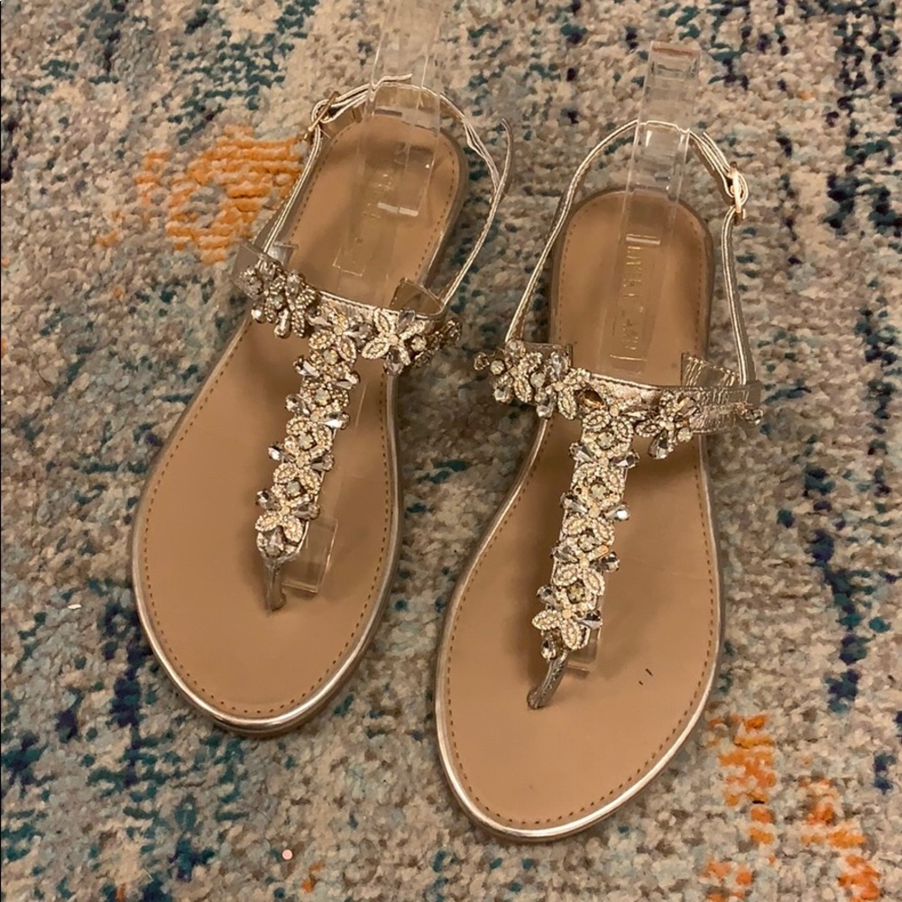 Gold sandals never used